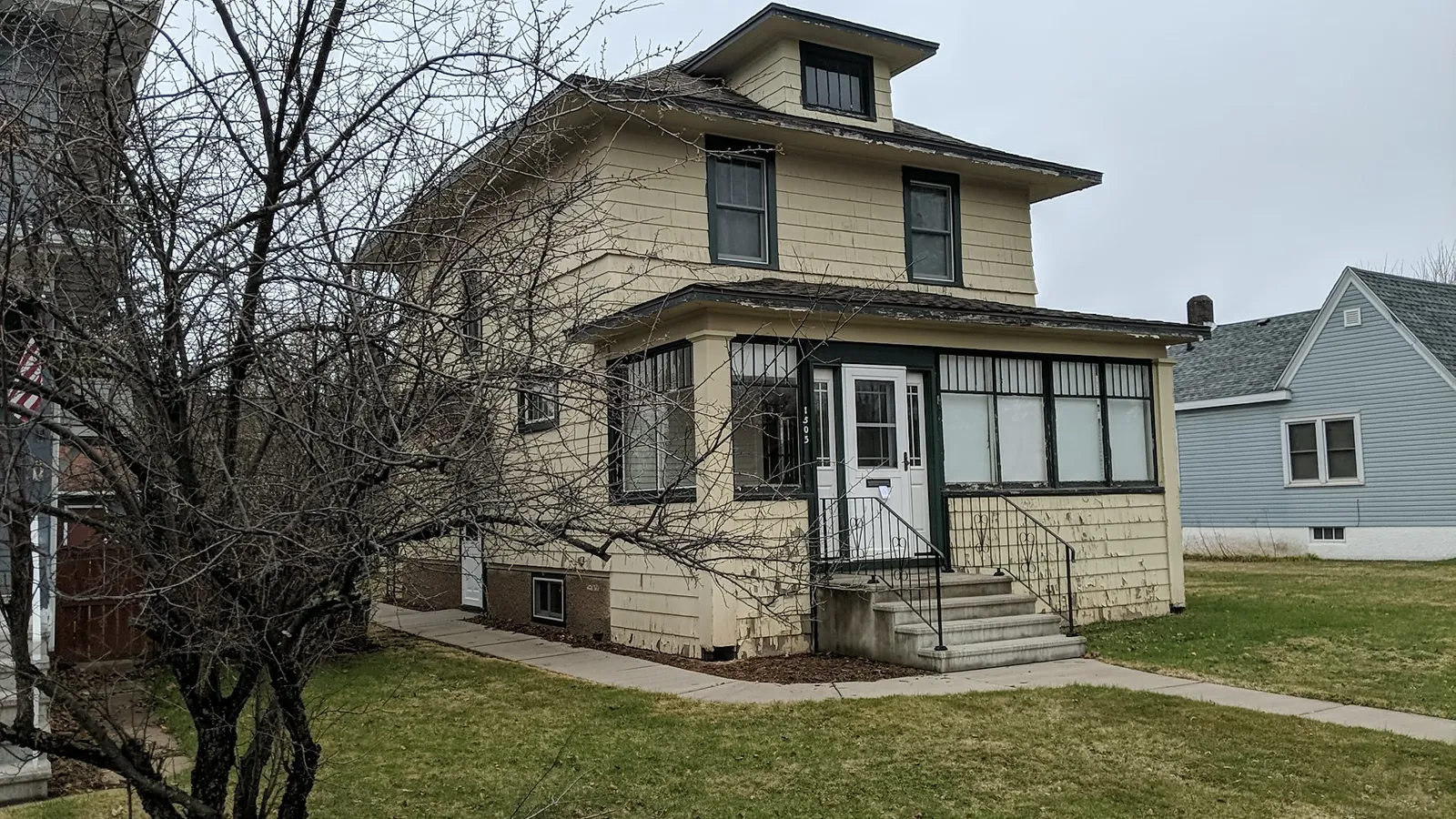 Home before new siding — Siding Transformation